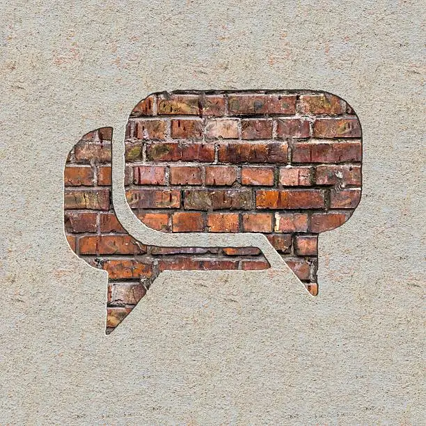 Photo of Speech Bubble Icon on the Wall.