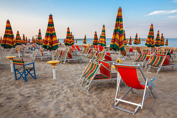 istock Summer beach landscape with umbrellas and beach chairs 467232356