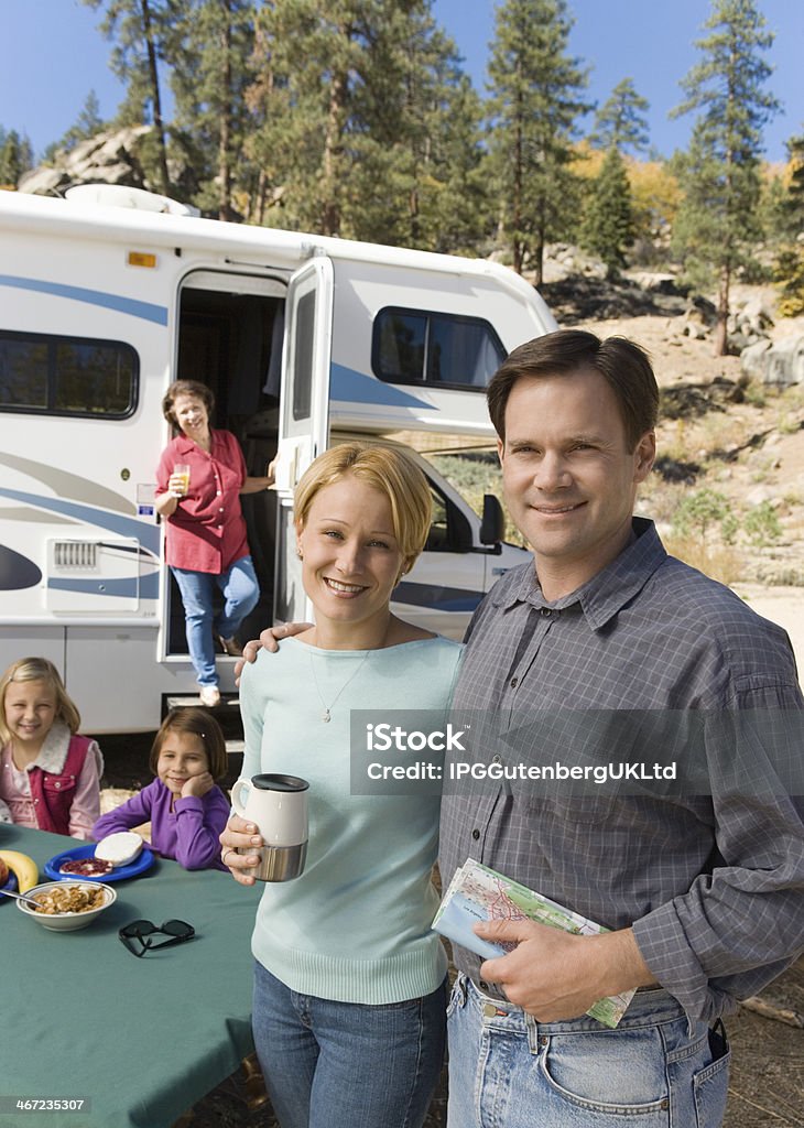Couple on Vacation with Family Family Stock Photo