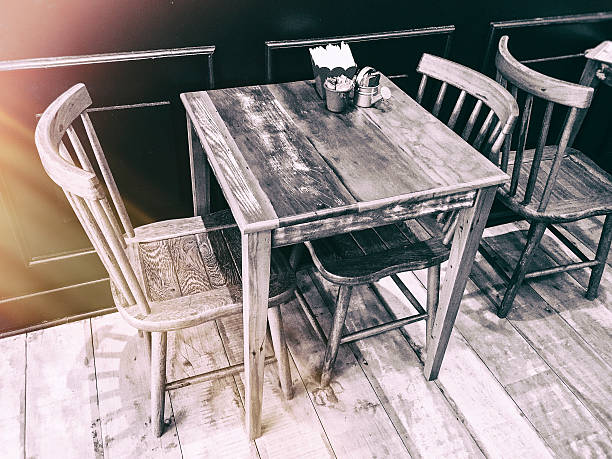 istock Wooden table and chairs in the cozy restaurant. 467239030