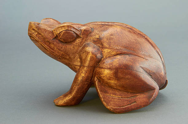 istock Figurine of frog from the tree. 467239773