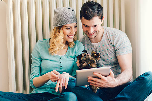 istock Happy Couple Shopping Online WIth Tablet. 467242228
