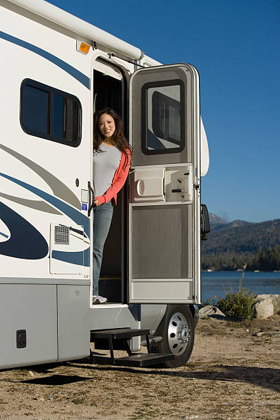 Woman Standing in RV Doorway