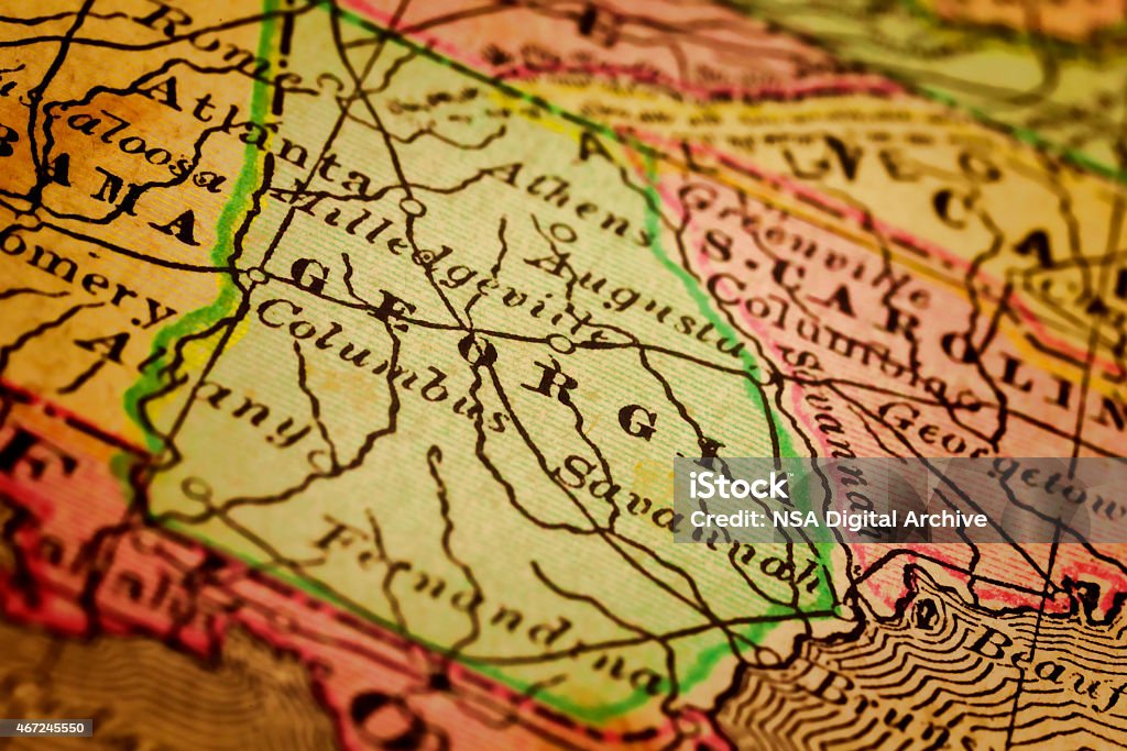 Georgia State, United States Georgia State, on an old 1880's map. Selective focus and Canon EOS 5D Mark II with MP-E 65mm macro lens. Columbus - Georgia Stock Photo