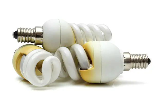 Photo of old  burnt used fluorescent incandescent bulbs
