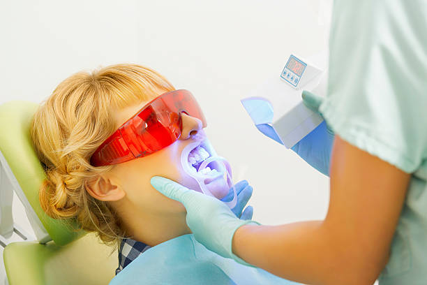 istock Dentistry  Dentist working    Teeth Whitening Dental Medical Process 467248634