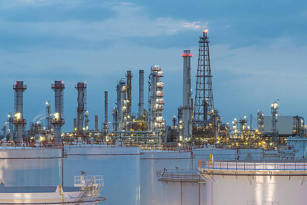 istock Oil refinery and storage tanks at twilight 467248688