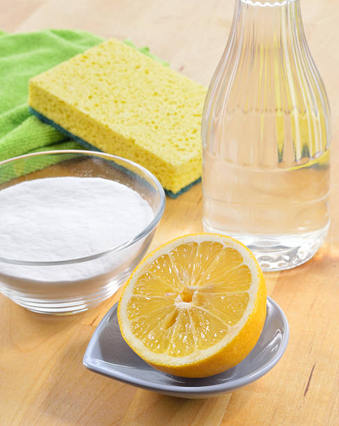 istock Natural cleaners. Vinegar, baking soda, salt and lemon. 467249269