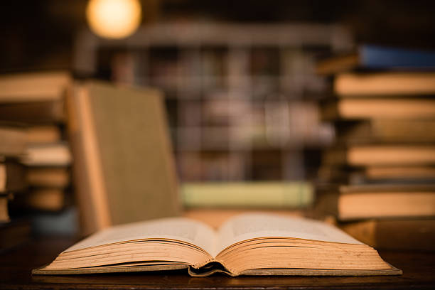 istock Vintage Books Sitting on Desk 467250311