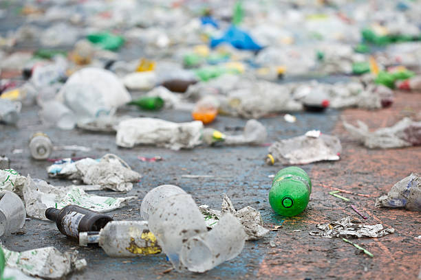 istock plastic bottle on the ground and more trash 467251800