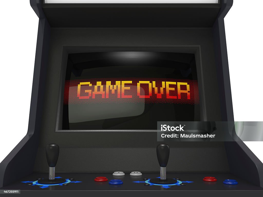 Game over screen on a black arcade game with two controllers Coin operated arcade machine with game over screen Amusement Arcade Stock Photo