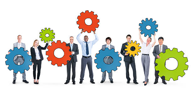 istock Business People Holding Gear Symbols 467256584