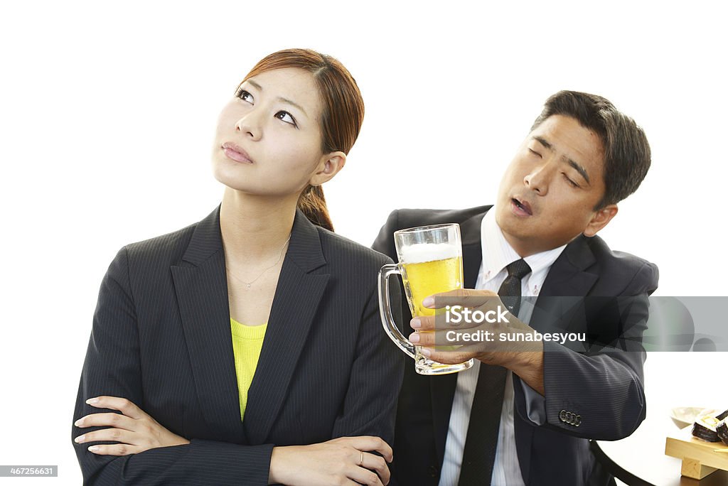 Drunken man with woman Drunken man with woman isolated on white background Disgust Stock Photo