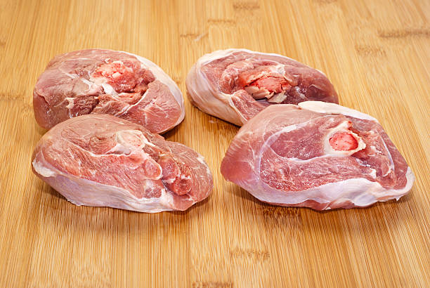 istock raw ossobuco on wooden board 467257263