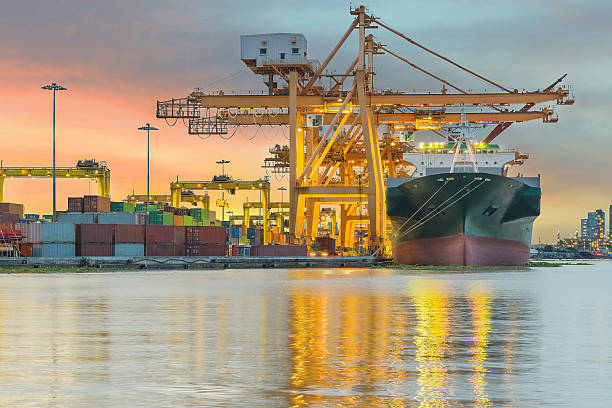 istock Industrial Container Cargo freight ship with working crane bridg 467257436