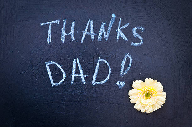 istock Thanks Dad, inscription by hand on a blackboard 467257612