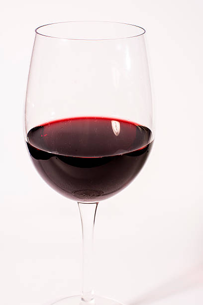 istock Half filled crystal glass of red wine 467262239