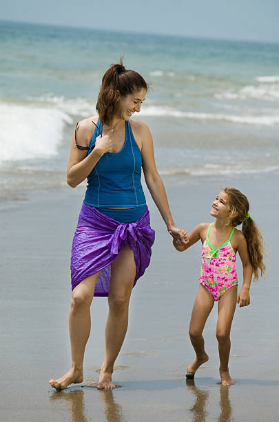 istock Mother and Daughter at the Beach 467262681