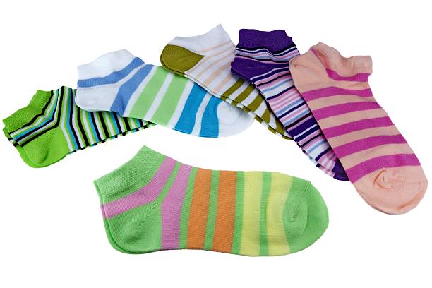 istock Stack Of Many Pairs Colorful Striped Socks Isolated On White 467267242