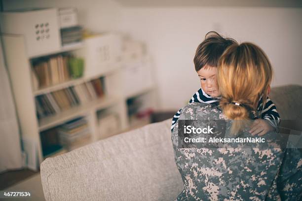 Woman Soldier Hugging Her Son Stock Photo - Download Image Now - 20-29 Years, 2015, Adult
