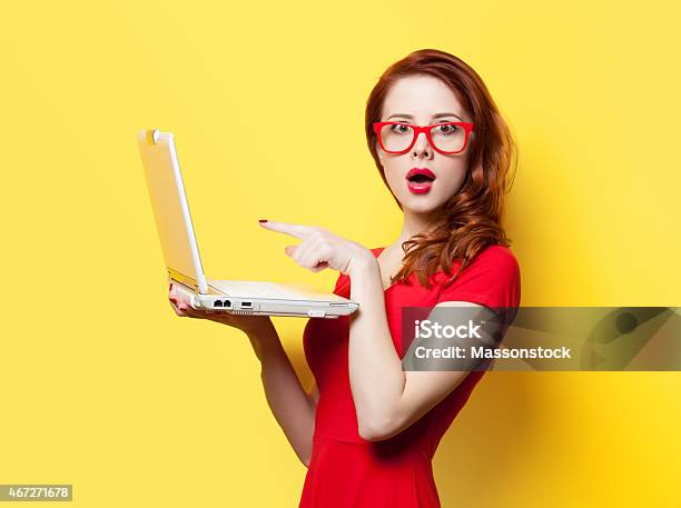 Surprised Redhead Girl With Laptop Stock Photo - Download Image Now - 2015, Adult, Adults Only