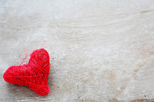 istock Red heart on plywood 467272356