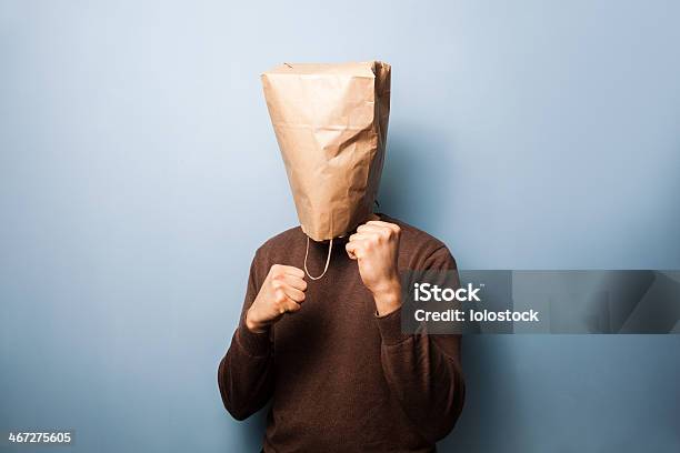 Stupid Young Man With Bag Over His Head Stock Photo - Download Image Now -  Wearing a Paper Bag, Men, Obscured Face - iStock