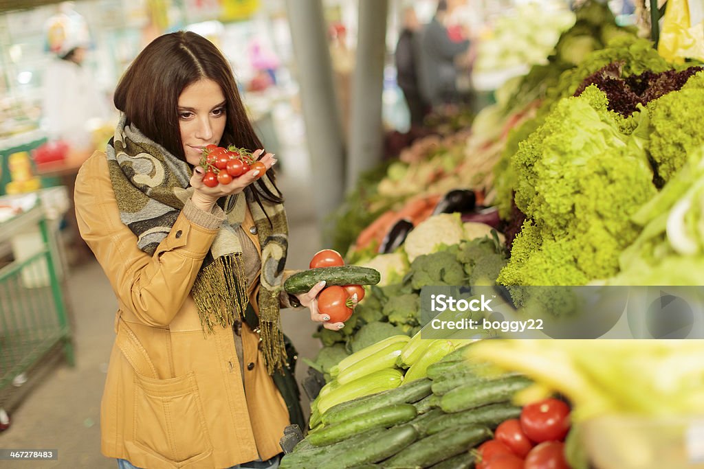 Young woman at the market Adult Stock Photo