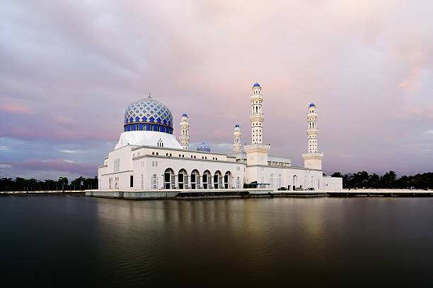 istock Kota Kinabalu City Mosque reflected in lagoon at dusk. 467278736