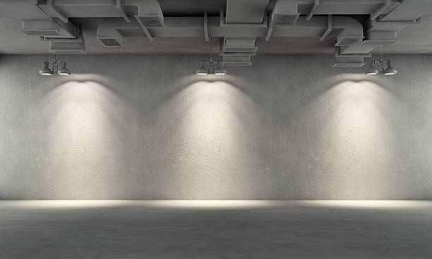 istock Room with ceiling lamps and concrete wall 467279821
