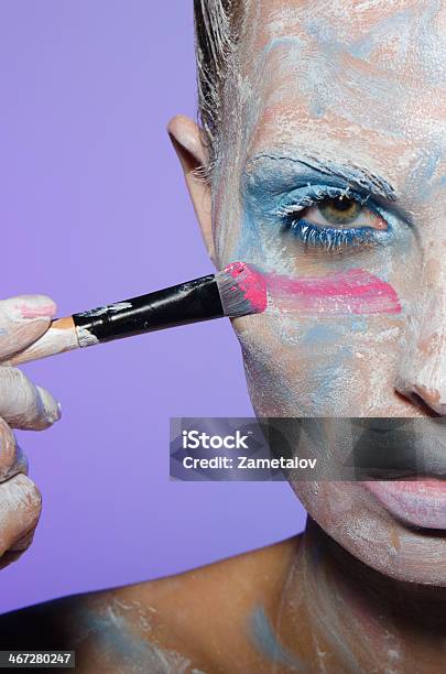 Portrait Of Woman Paint Their Face In Colors Stock Photo - Download Image Now - 20-29 Years, Adult, Adults Only