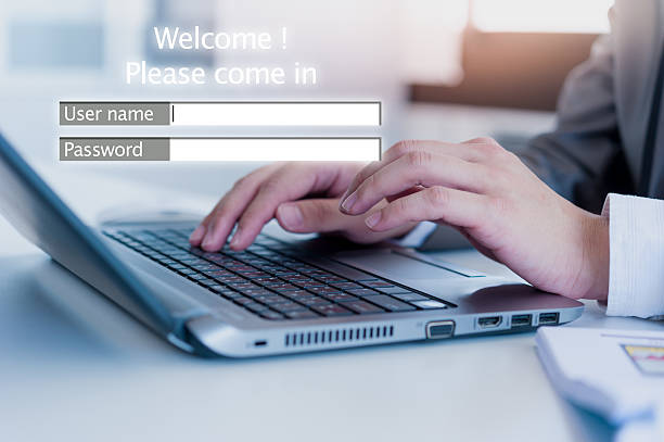 istock Pair of hand using laptop for logging in to secured website 467285802