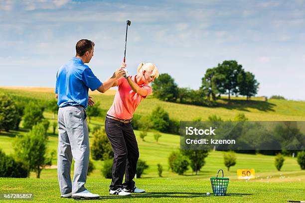 Young Female Golf Player On Course Stock Photo - Download Image Now - Golf, Instructor, Teacher