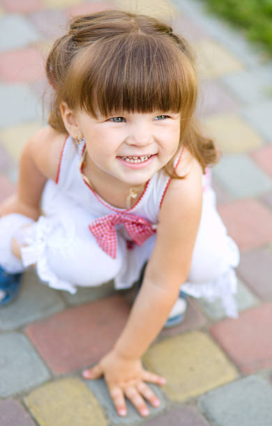 istock Young girl is playing outdoors 467286103