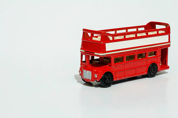 istock toy red london bus isolated on a white background 467287408