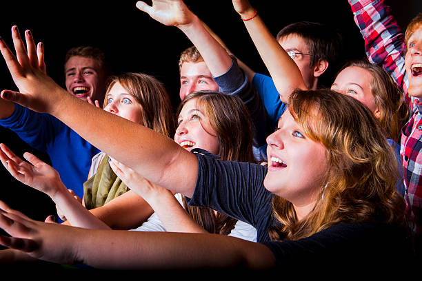 istock Excited and Ecstatic Teens at a Concert or Event 467287422