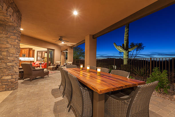 Luxury Desert Home Patio Luxury desert home patio with dining table after sunset. scottsdale arizona stock pictures, royalty-free photos & images