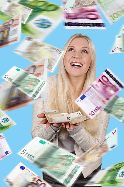istock Woman with lots of banknotes 467289088