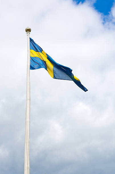 istock Swedish flag blue with yellow cross 467289264