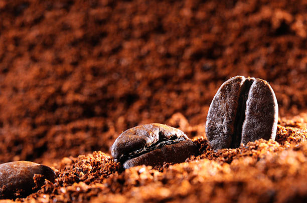 istock Three grains on a heap of coffee 467289310
