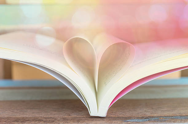 istock Heart shaped padlock with key and Heart book 467290196