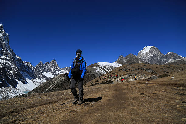 istock trekker  beside of everest basecamp 467292515