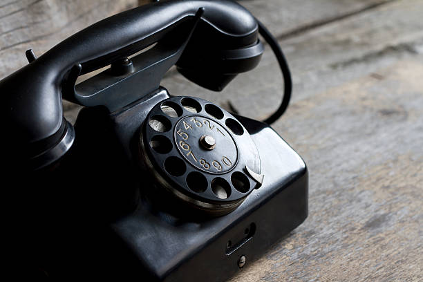 istock Old retro telephone on vintage boards 467292694