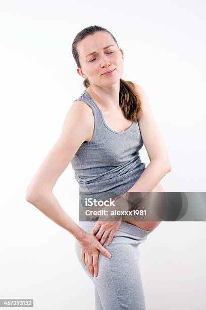 Pregnant Woman With Strong Pain In Leg Stock Photo - Download Image Now - 2015, Adult, Adults Only