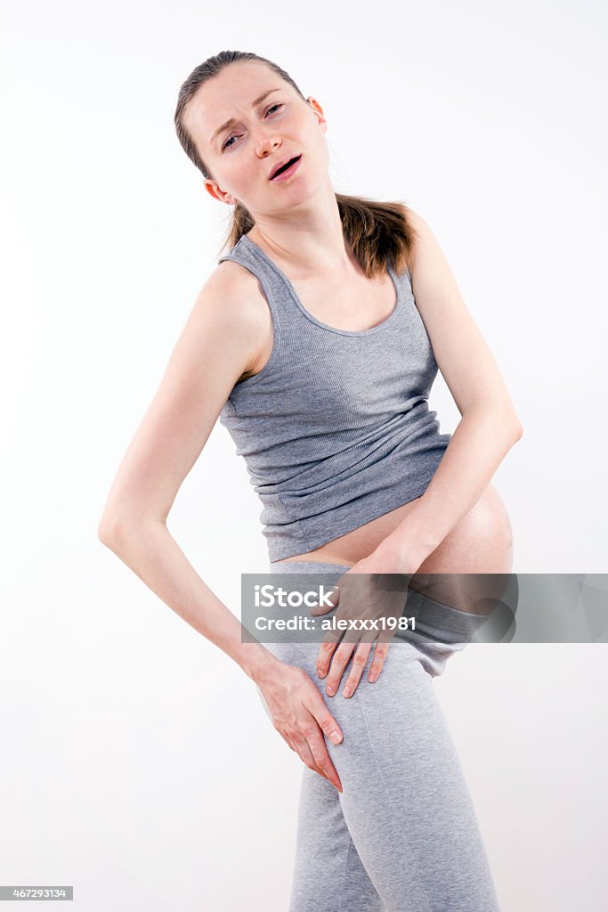 harbingers of childbirth -ache of leg young pregnant woman with harbingers of childbirth  2015 Stock Photo