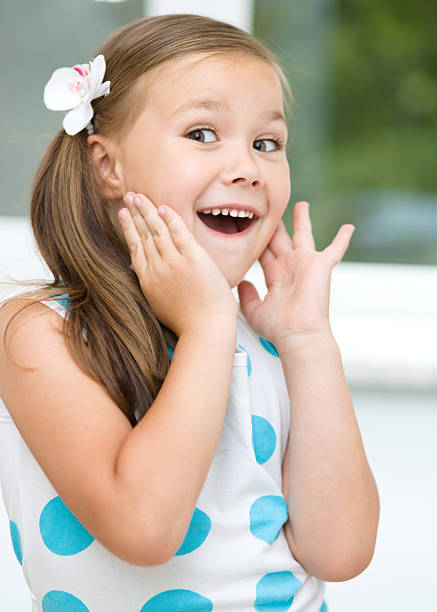 istock Little girl is holding her face 467294237