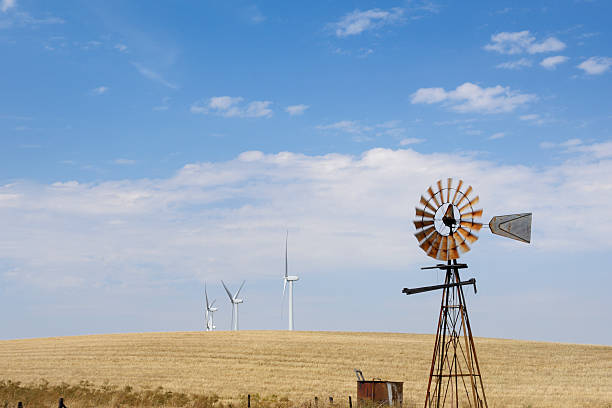 istock Old Windmill with Wind Turbines in Background 467294419