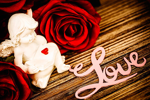 Cupid Cherub and Red Roses