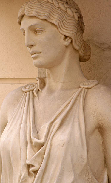 istock Ancient female statue on the building 467296079