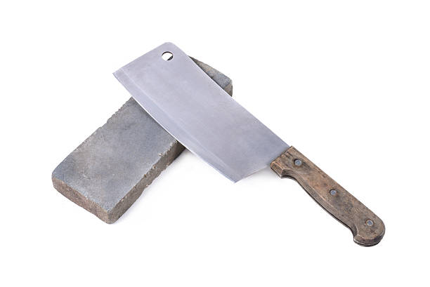 istock Sharpening or honing a knife on a waterstone, grindstone 467296306